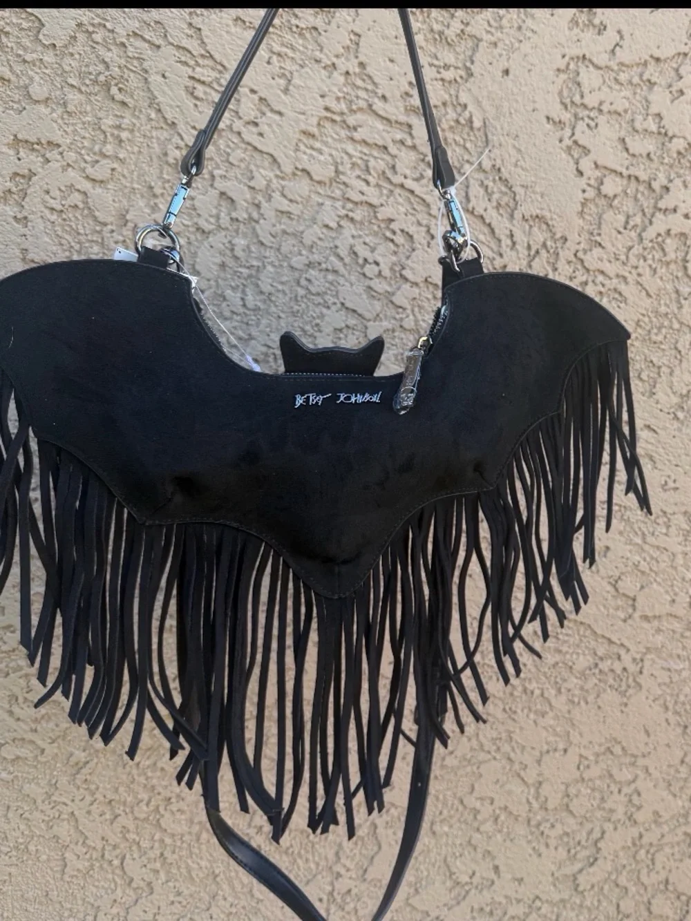 Betsey Johnson statement bat